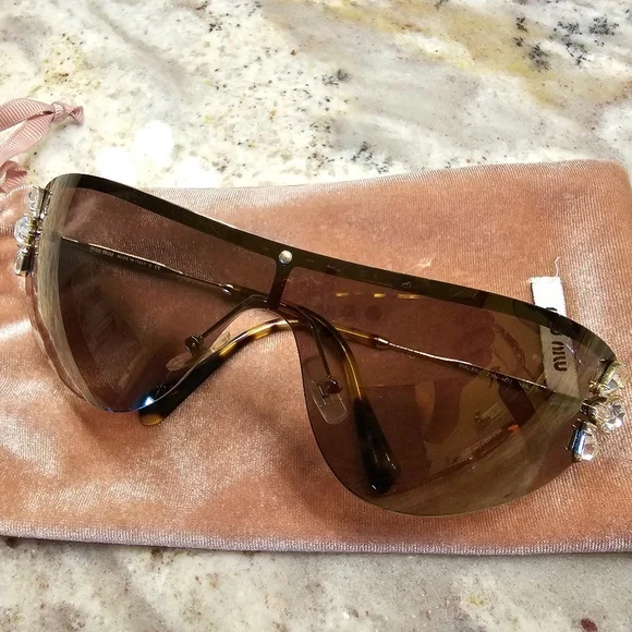 Miu Miu | Accessories | Miu Miu Womens Frameless Sunglasses  display picture 1